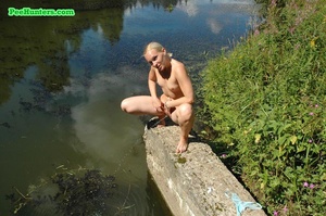 See naughty teen princess pissing into the lake