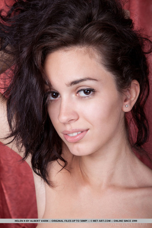 Beautiful natural brunette undresses