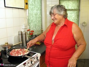 Big fat grandma cooking