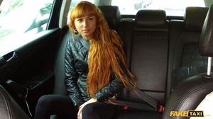 Cute redhead wearing black