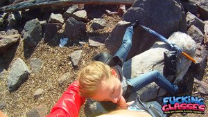 Smiling young blonde jeans