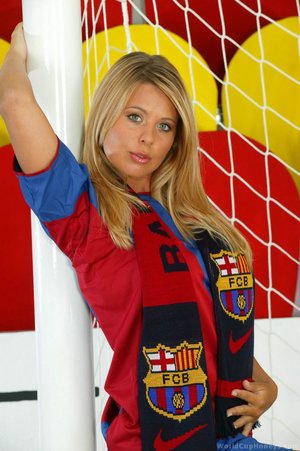 In barcelona colors this kinky blonde strips out of her uniform