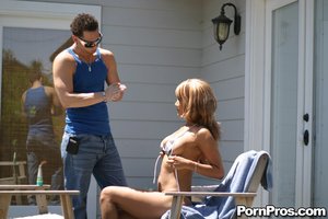 Cheating wife got an erotic rubdown while having sunbathing on their yard