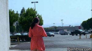 Thick chick in orange dress shows her irresistible figure in public