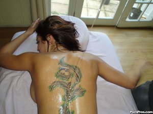 Tattoed slut receives an intense bang after her kinky massage