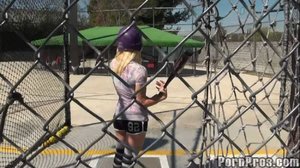 Kinky blonde babe plays with a bat after baseball practice