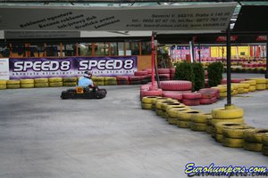 Busty redhead rides a cock after enjoying the go kart track