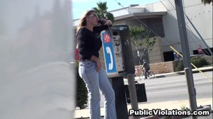 Older and blonde, on a payphone, she hangs out on a corner in jeans