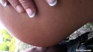 A hand, tipped in white nails, wipes up cum as it drips down her round ass