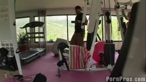 Tits drop out of her pink top, as she's plowed bareback on some exercise equipment