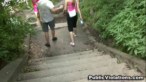 Wearing very short shorts, this cunt in pink, struts down the street, followed by the camera