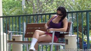 On a bench in the park, this chubby whore in purple gets a surprise from a stranger
