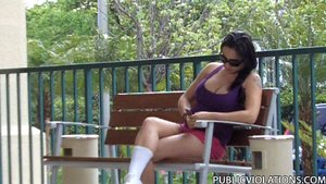 On a bench in the park, this chubby whore in purple gets a surprise from a stranger