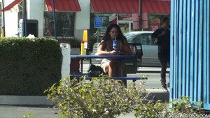 Hanging out at a restaurant, she relaxes in public as she's filmed unknowingly