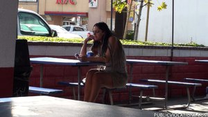 Hanging out at a restaurant, she relaxes in public as she's filmed unknowingly