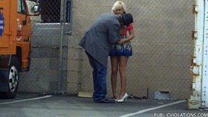 Squatting next to a fence, this bleach blonde loves giving head in public places