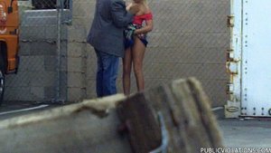 Squatting next to a fence, this bleach blonde loves giving head in public places