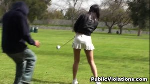 Golfing in a leather jacket and a short white skirt, she gets violated in public