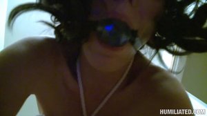 Tied up, tits covered in cloths pens, she gets pounded, face pressed against the toilet