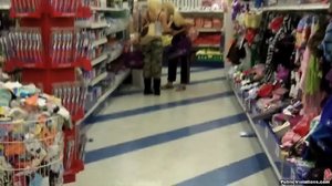 Sneaking up behind this blonde, he drags her bottom down, exposing her cunt