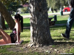 Watching this brunette slut, wearing a skirt, from a distance as she relaxes