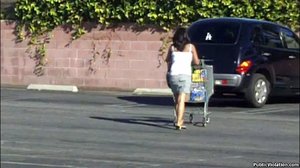 Following her through the grocery store, he watches her every move