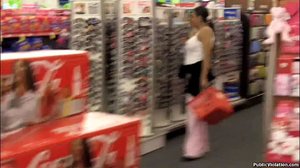 A brunette tramp in pink, gets followed around the store, by her stalker