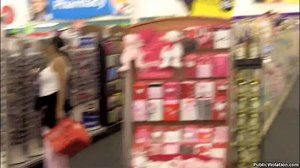 A brunette tramp in pink, gets followed around the store, by her stalker