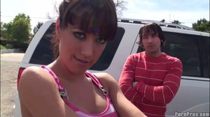 Bobbing in his lap, this tramp with bangs takes a load of cum in her mouth