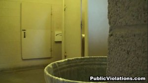 Blonde, with huge tits, she gets sprayed while sitting in the stall